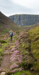 Woman walking up Quiraing, Isle of Skye 